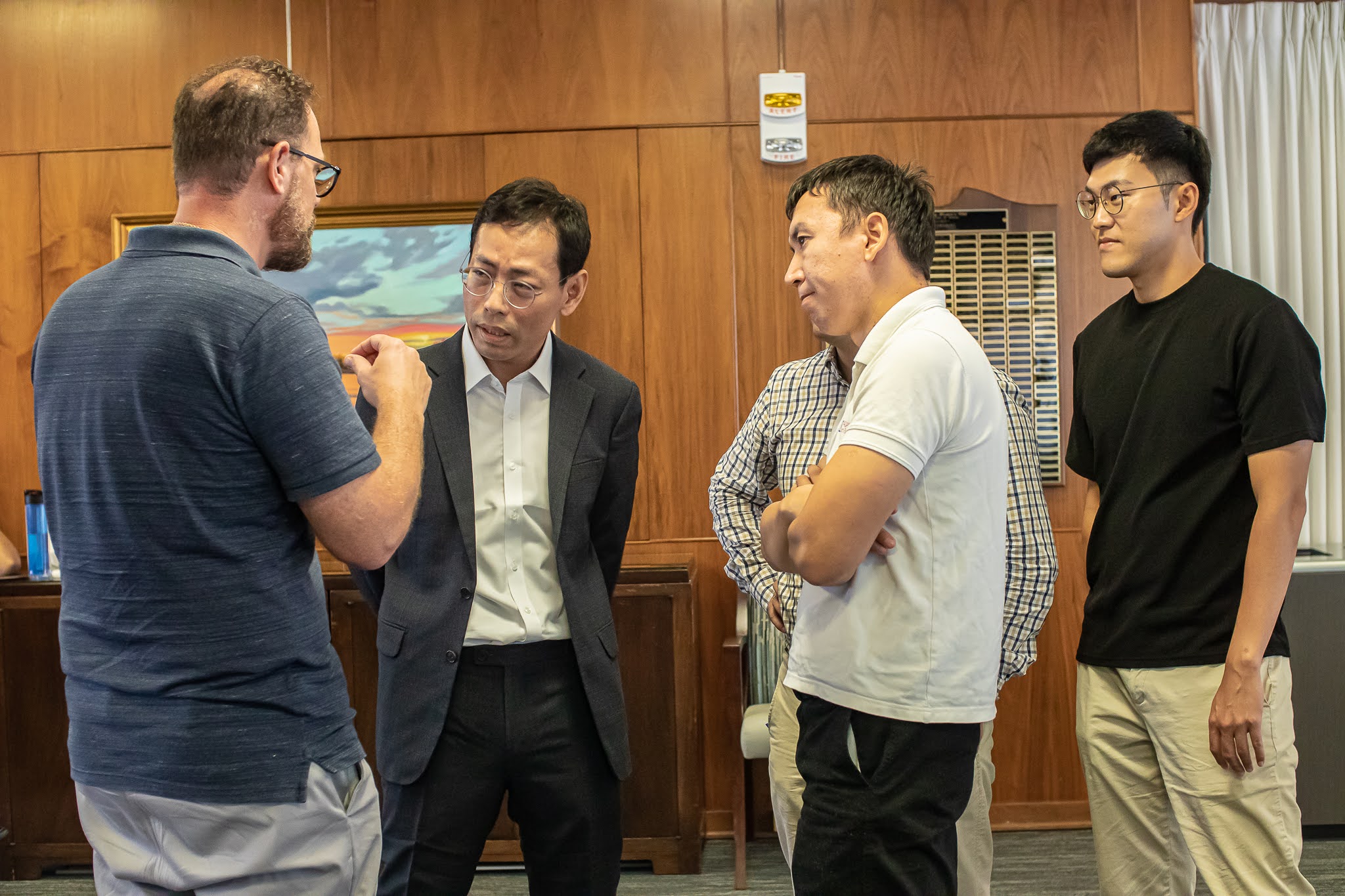 Hubert H. Humphrey Fellows chatting with the Senior Internationalization Officer