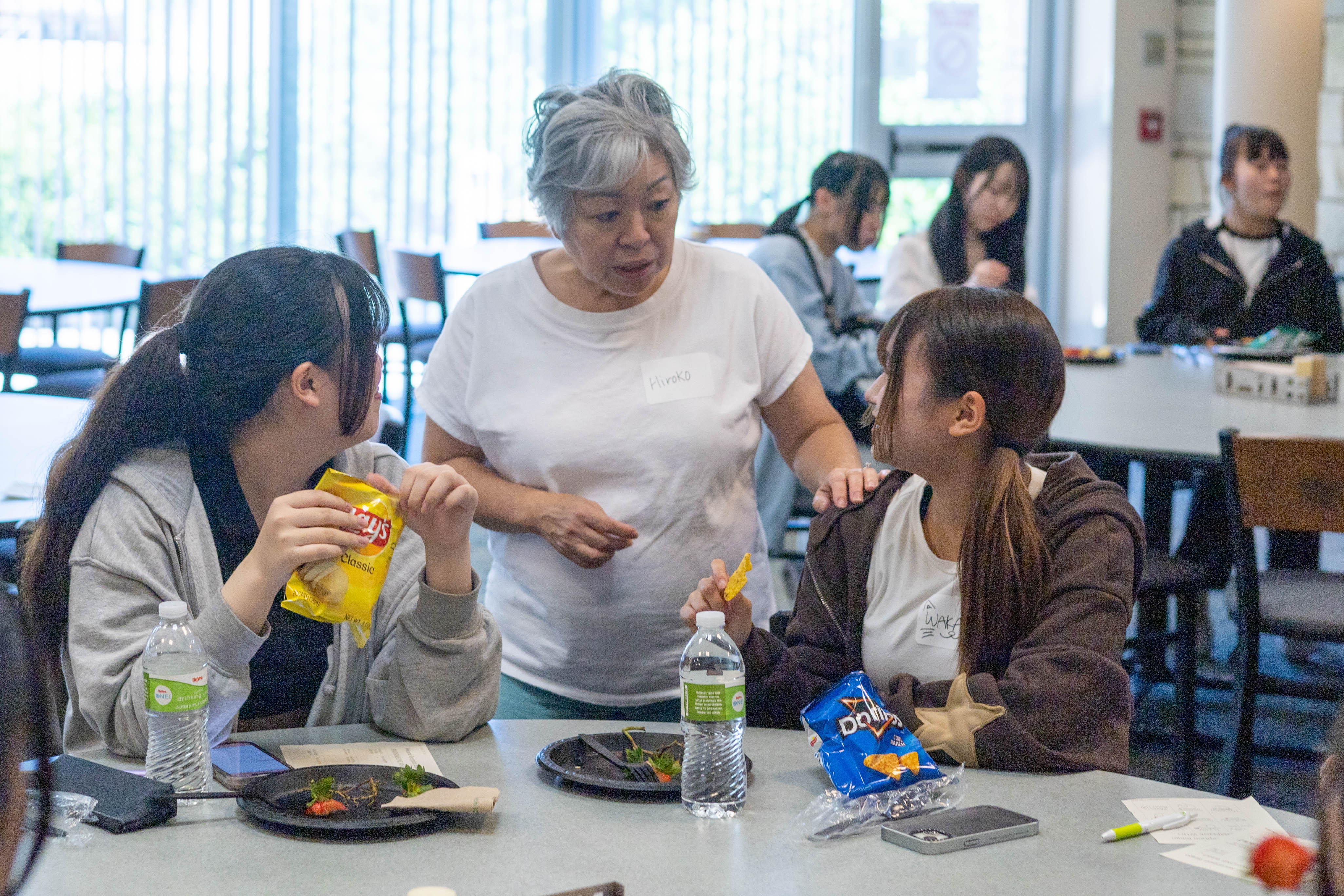 Students at a reception for a high school program