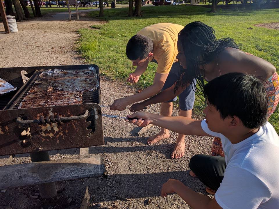 Fulbright Fellows learning how to roast marshmallows